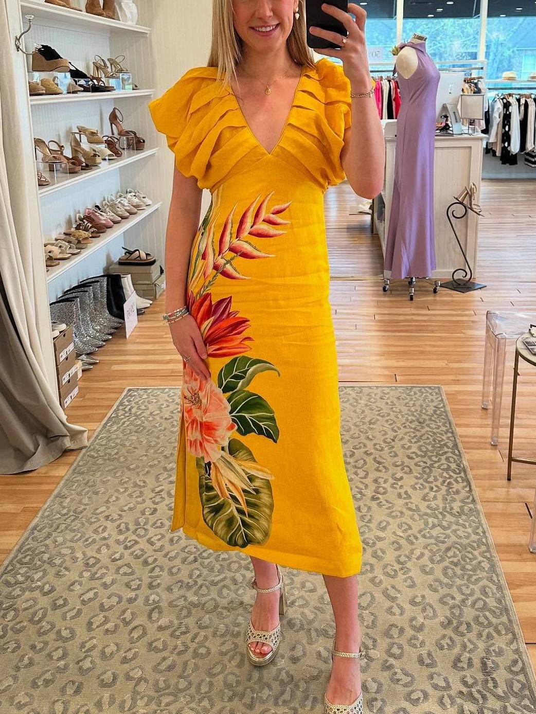 Robe imprimée plissée à col en V