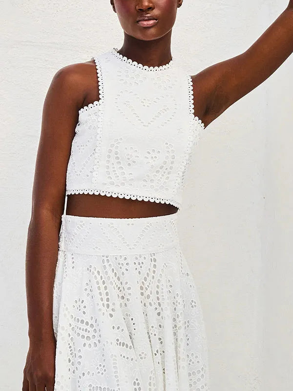 Haut exquis sans manches en dentelle creuse brodée