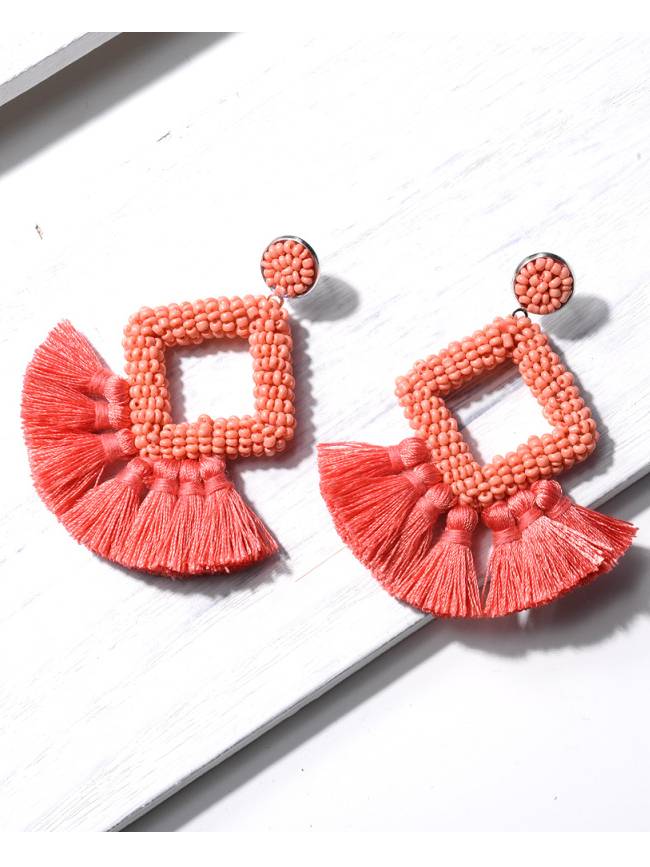Boucles d'oreilles à pompons tissées à la main