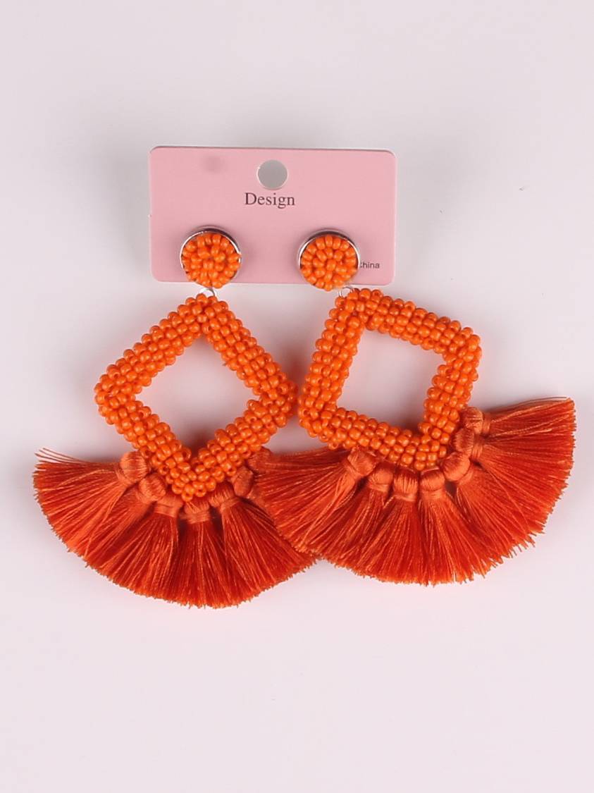 Boucles d'oreilles à pompons tissées à la main