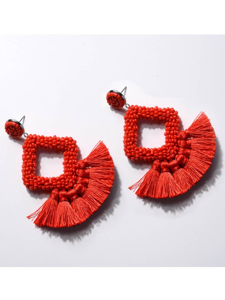 Boucles d'oreilles à pompons tissées à la main