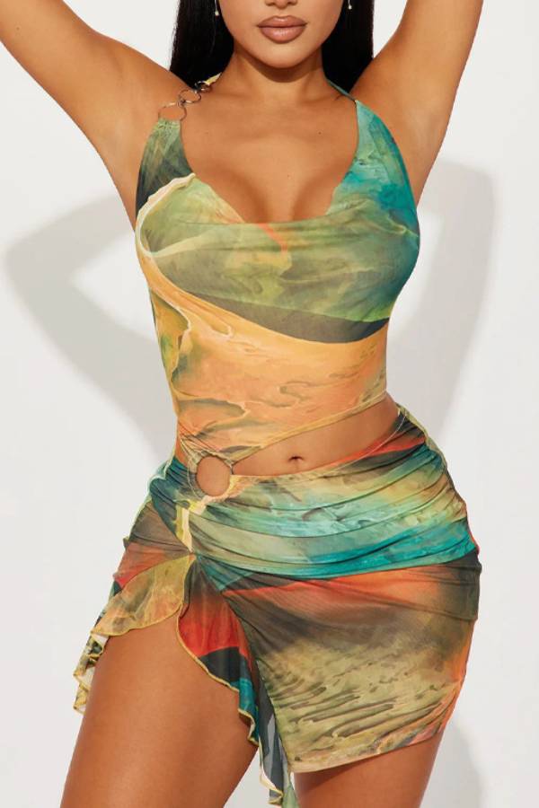 Printed halter-neck crop top and irregular hem skirt set