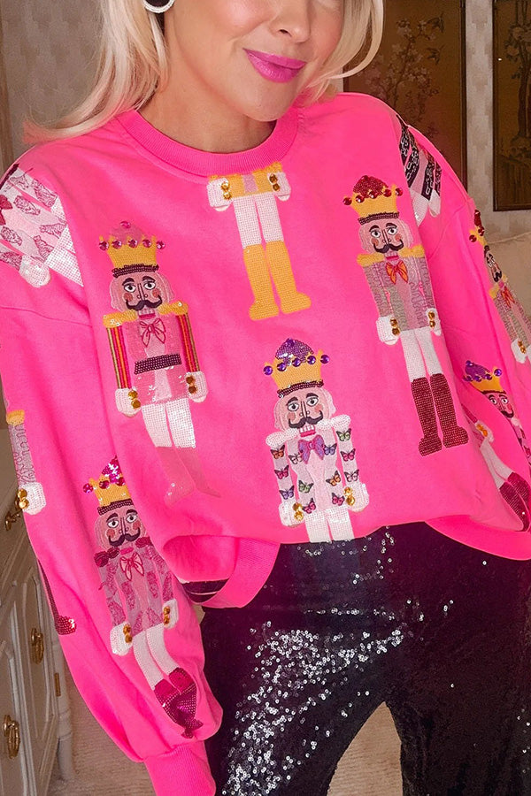 Holiday Traditions Colorful Nutcracker Printed Loose Sweatshirt Pink