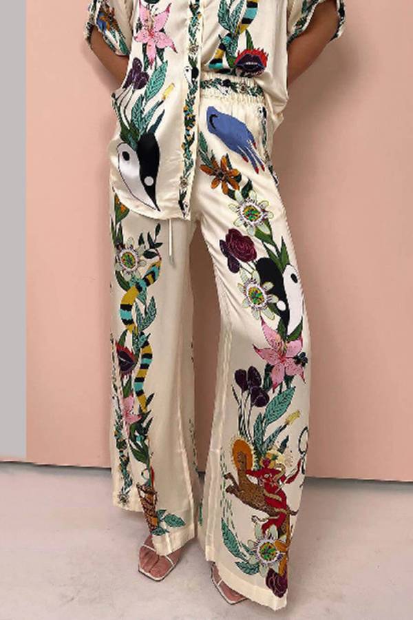 CLAIRE SATIN UNIQUE PRINT ELASTIC WAIST POCKETED WIDE LEG PANTS Multicolor