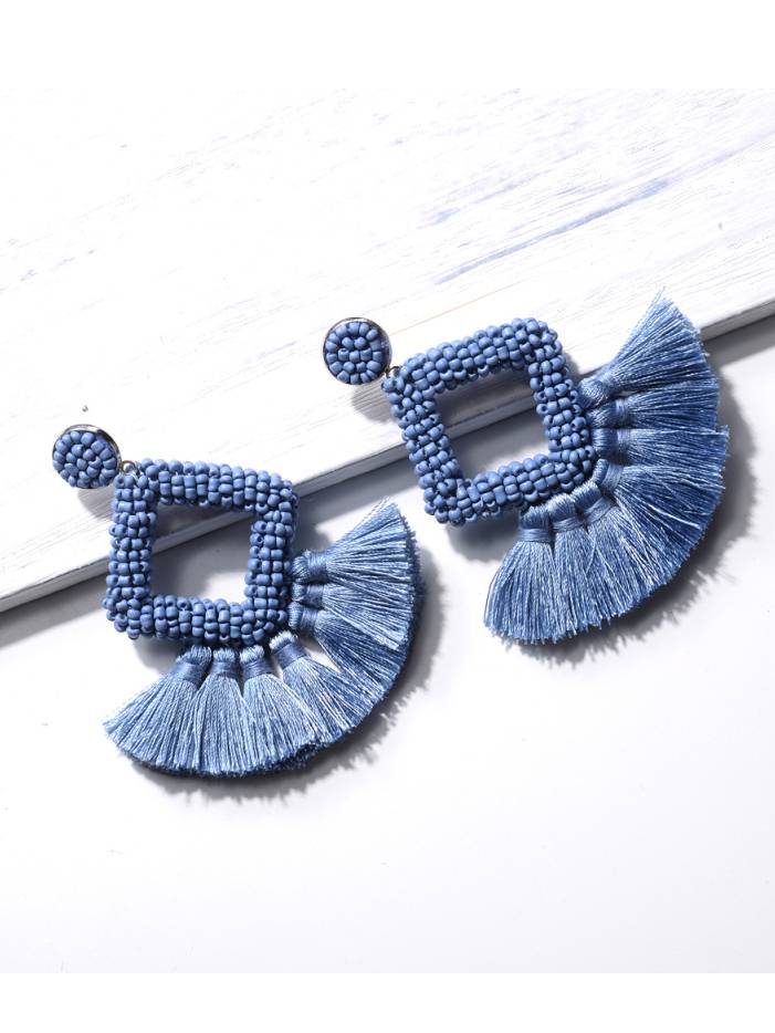 Boucles d'oreilles à pompons tissées à la main