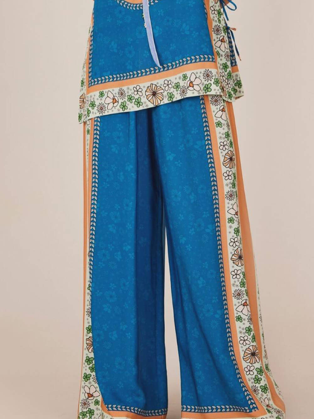 Pantalon ample à taille élastique et imprimé floral unique et classique