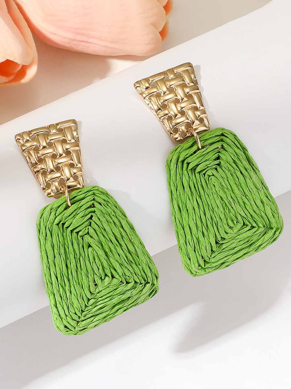 Boucles d'oreilles rétro tressées exagérées