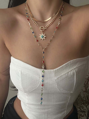 Süße, mehrschichtige Schlüsselbeinkette mit Sonnenblumen-Quaste