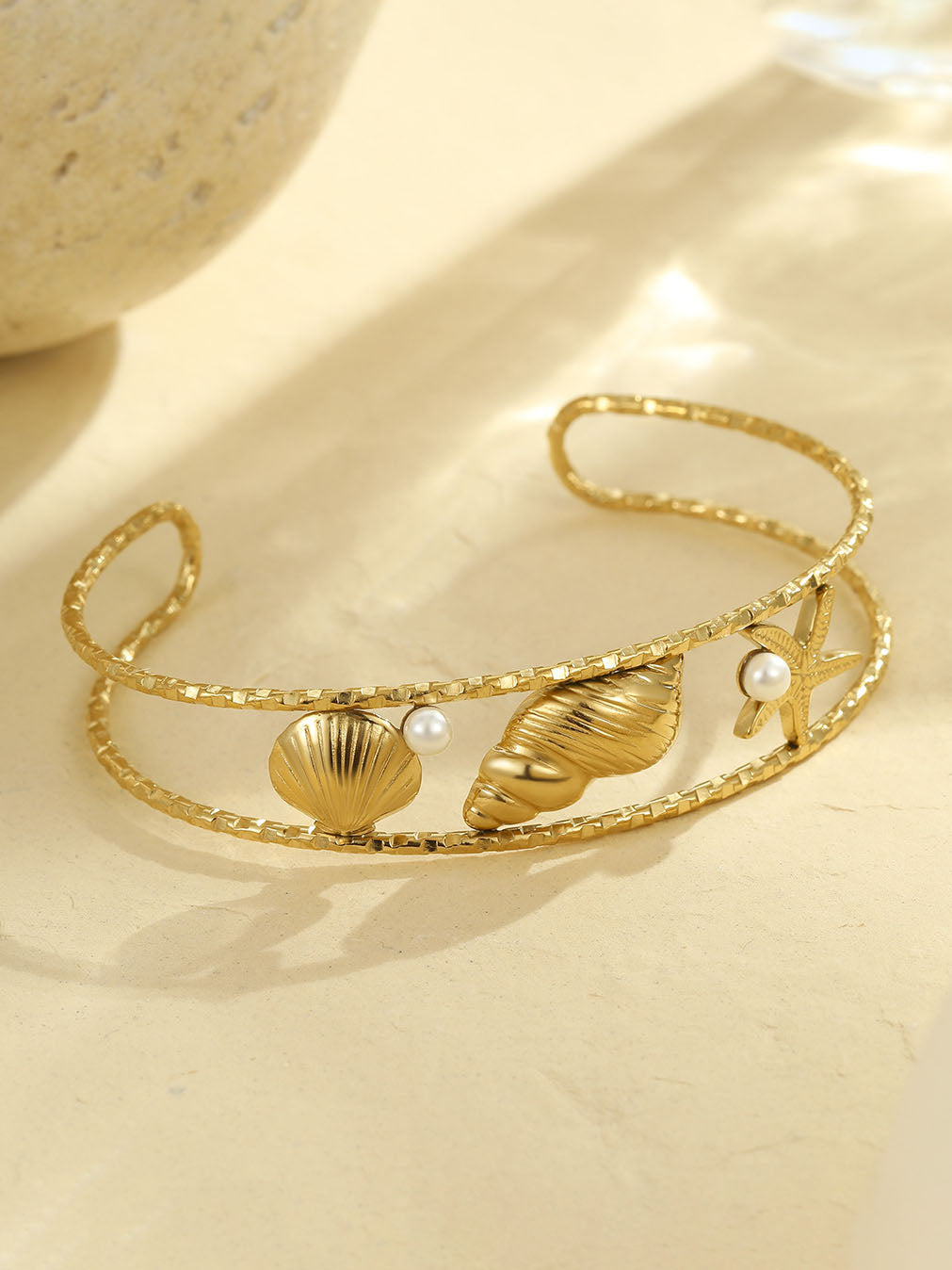 Bracelet personnalisé en coquillages et fruits de mer