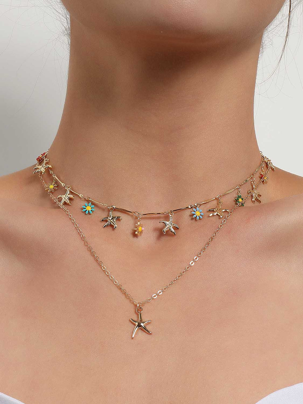 Collier avec pendentif étoile de mer de style hawaïen et fleur émaillée