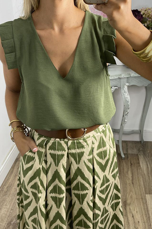 V-neck fashion shirt with ruffles on the shoulders