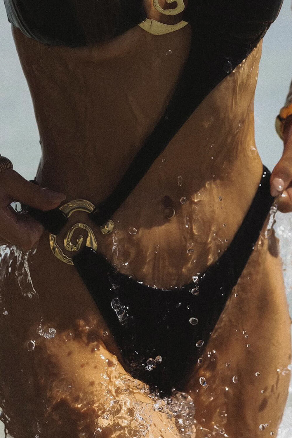 Black One Shoulder One Piece Swimsuit With Gold Spiral Hardware Details