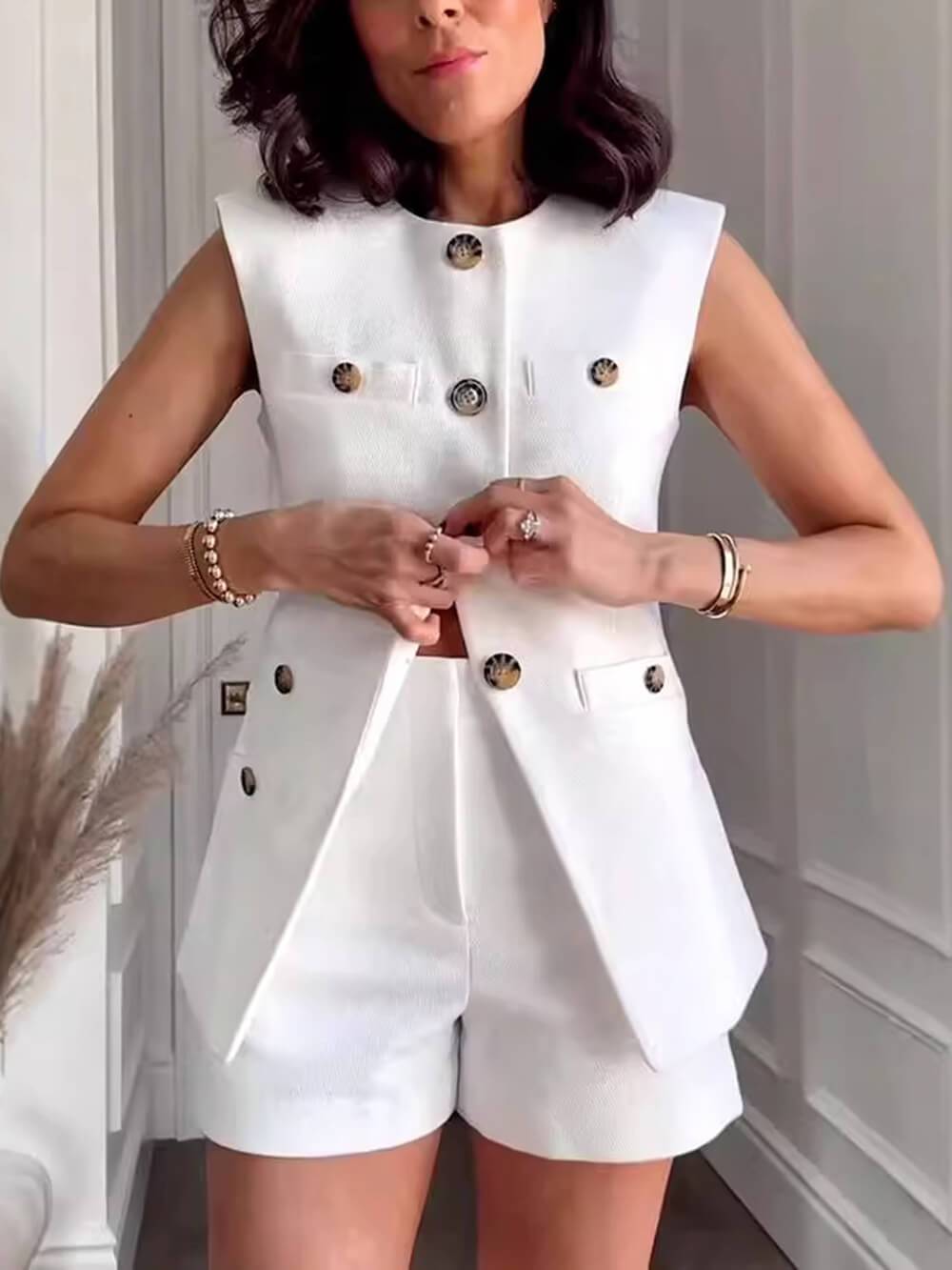 Veste décontractée sans manches à plusieurs boutons de couleur unie