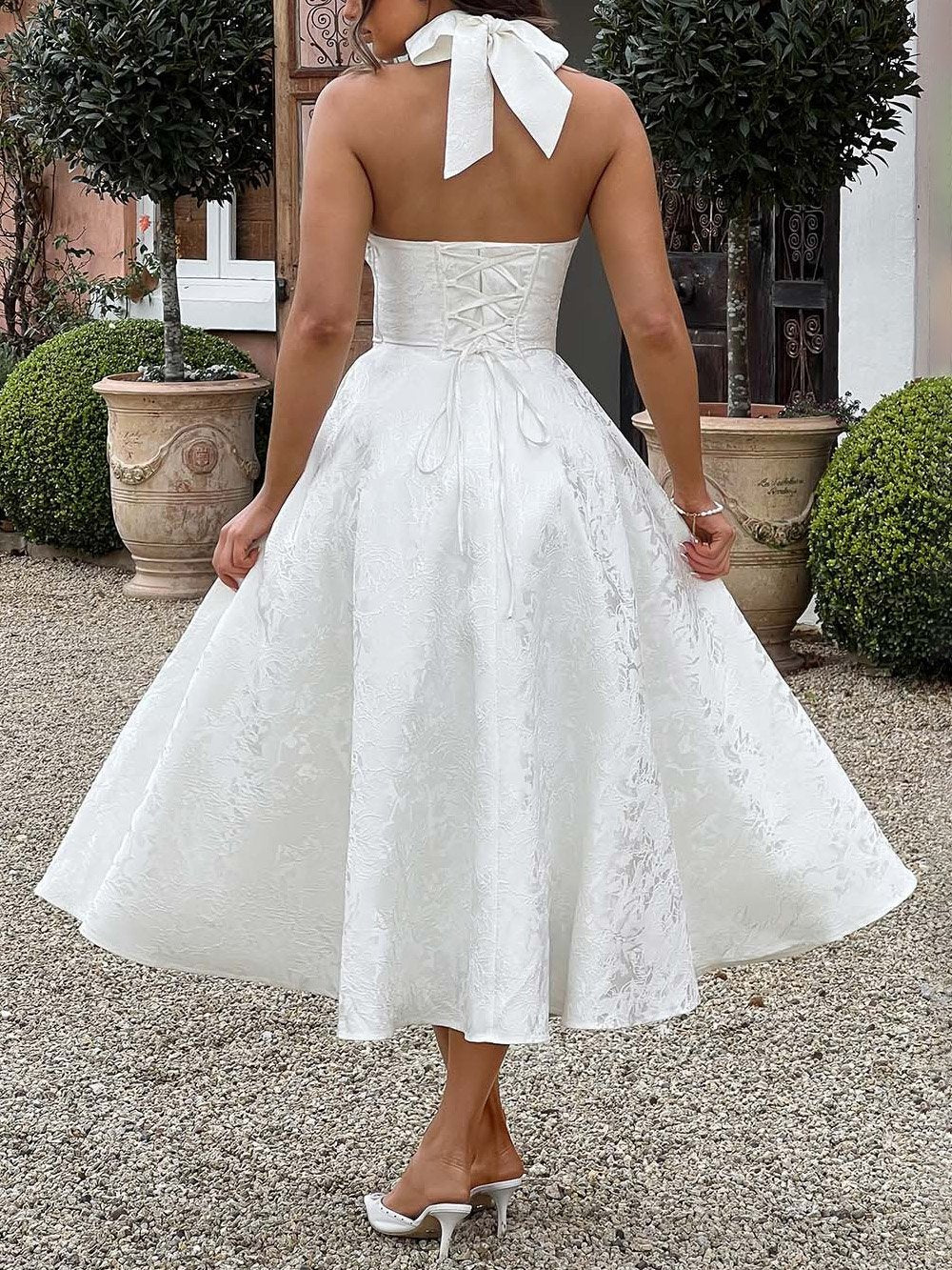 Elegantes Vintage-Midikleid aus Jacquard mit V-Ausschnitt und Neckholder