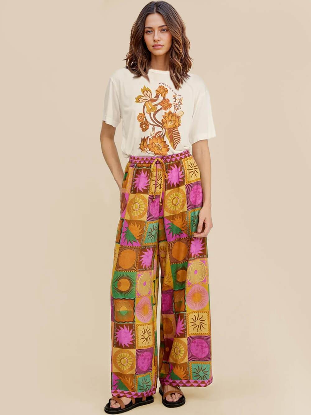 Einzigartige lockere Hose mit weitem Bein und Sonnenmuster
