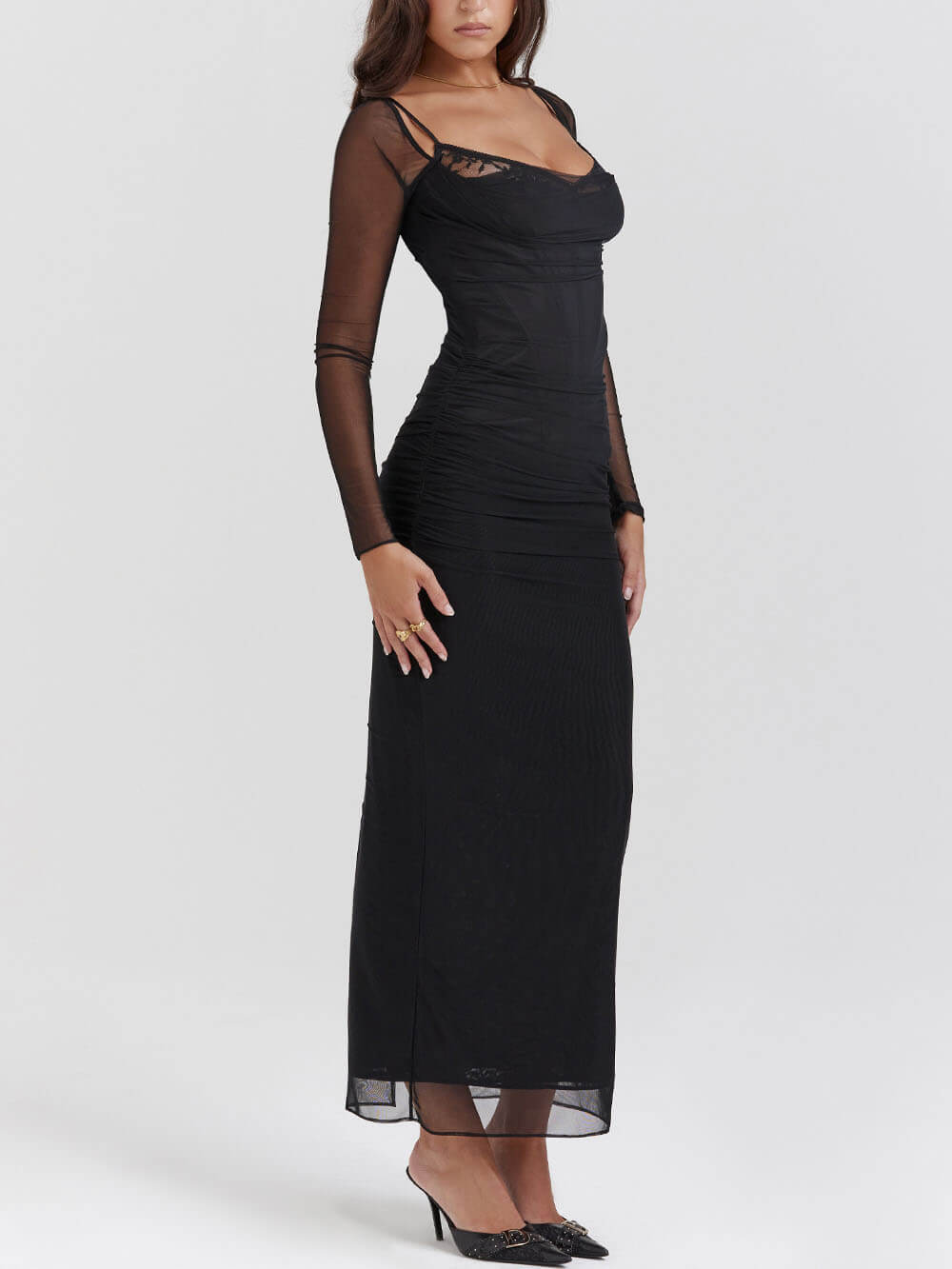 Schwarzes, rückenfreies, figurbetontes Maxikleid mit Strumpfhaltern